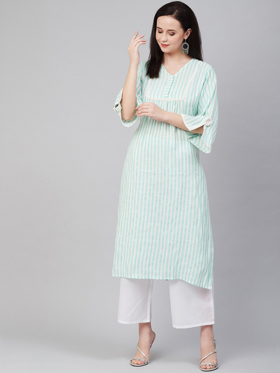 

Bhama Couture Women White Striped Kurta with Palazzos