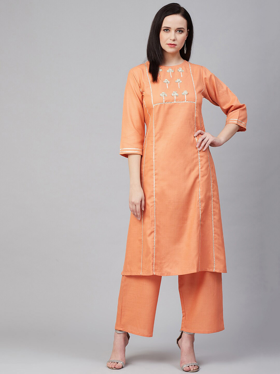 

Bhama Couture Women Peach-Coloured Yoke Design Kurta with Palazzos