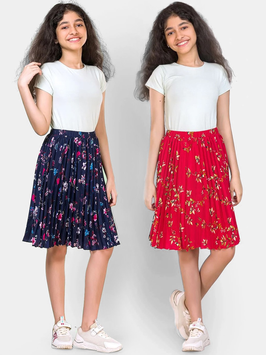 

Uptownie Lite Girls Pack of 2 Red & Navy Blue Printed Pleated Skirts