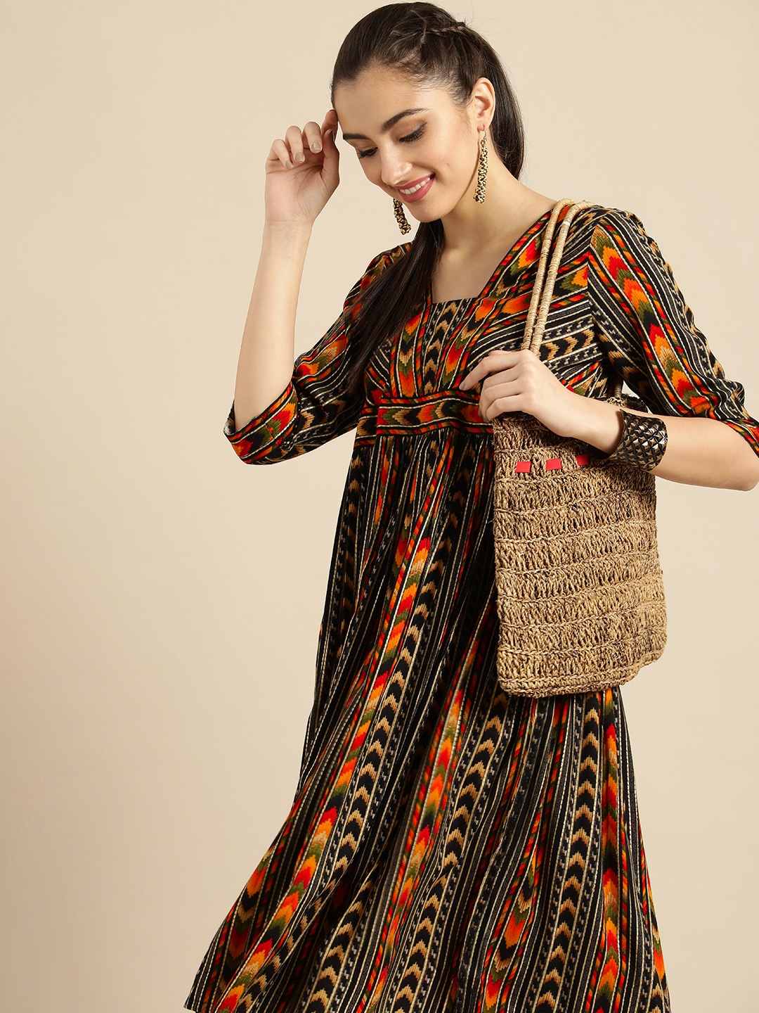 

Sangria Women Black & Orange Striped Kurta