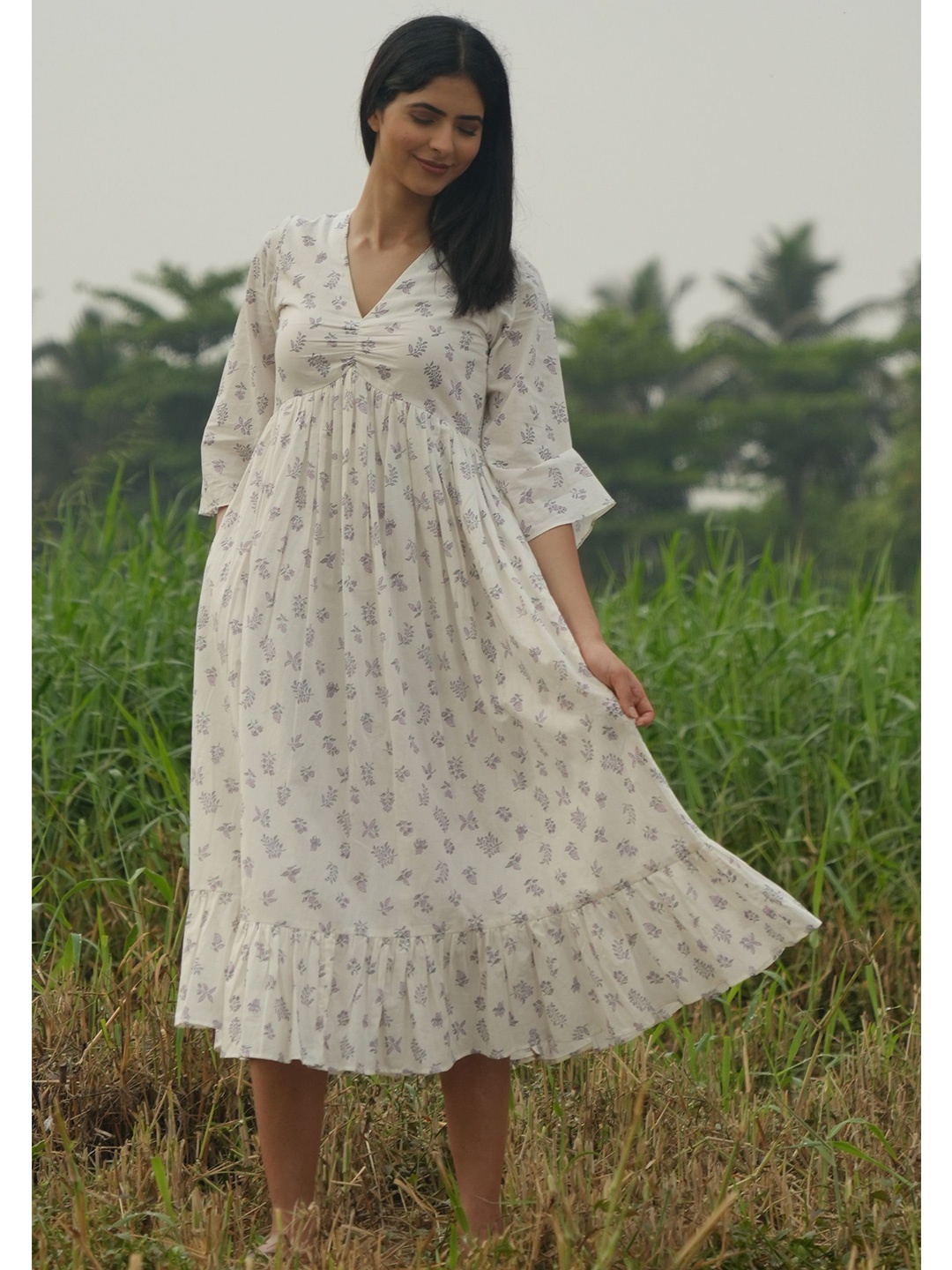 

the kaatn trail Purple Floral A-Line Midi Dress