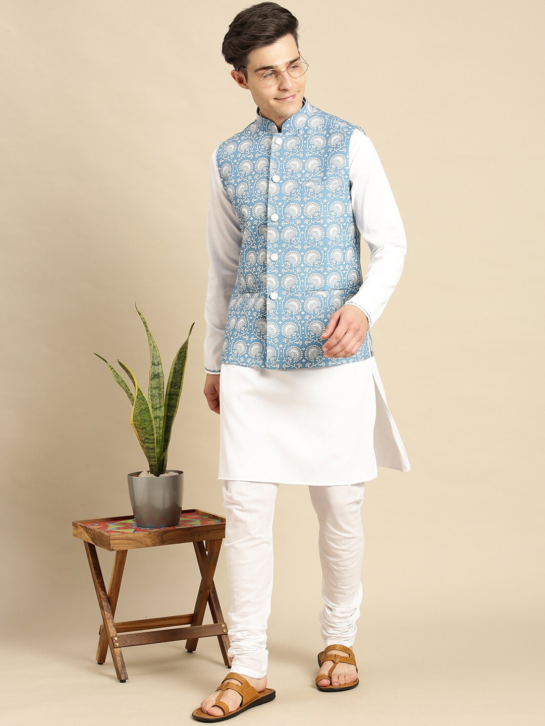 

Sanwara Men Blue Floral Kurta with Churidar & Nehru Jacket