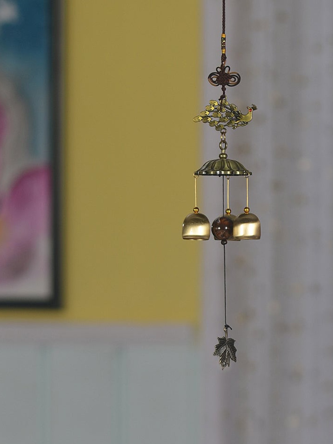 

Athome by Nilkamal Green Hanging Peacock Trunk Windchime