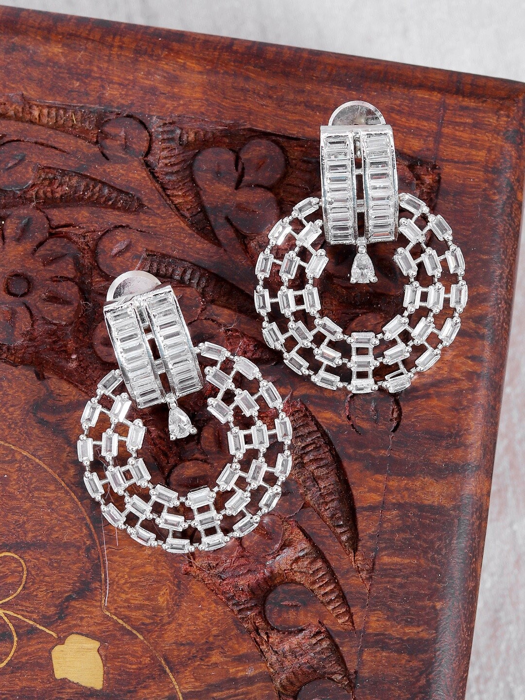 

SwaDev Silver-Toned Contemporary Half Hoop Earrings