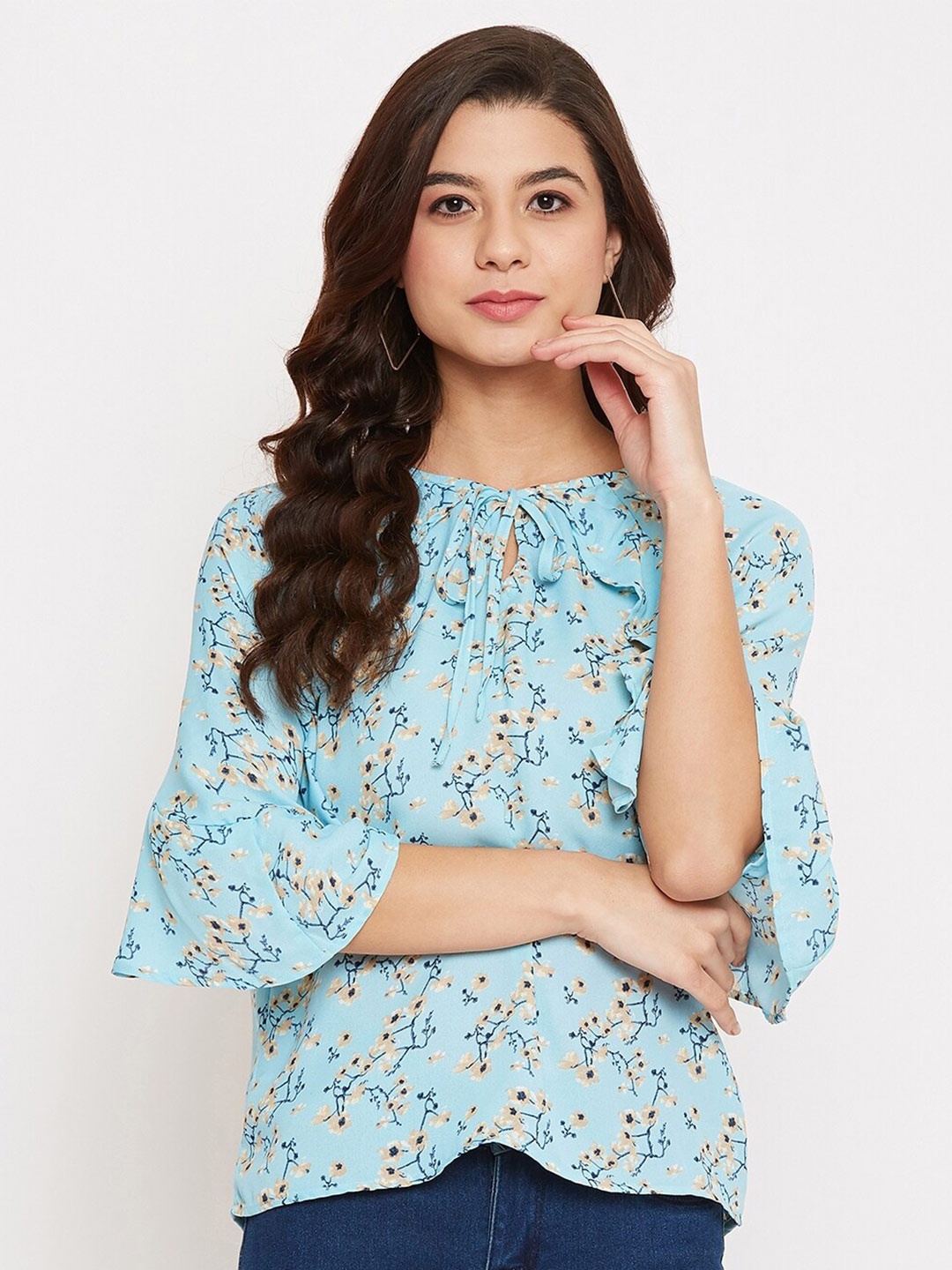 

Ruhaans Blue Floral Print Mandarin Collar Georgette Styled Back Top