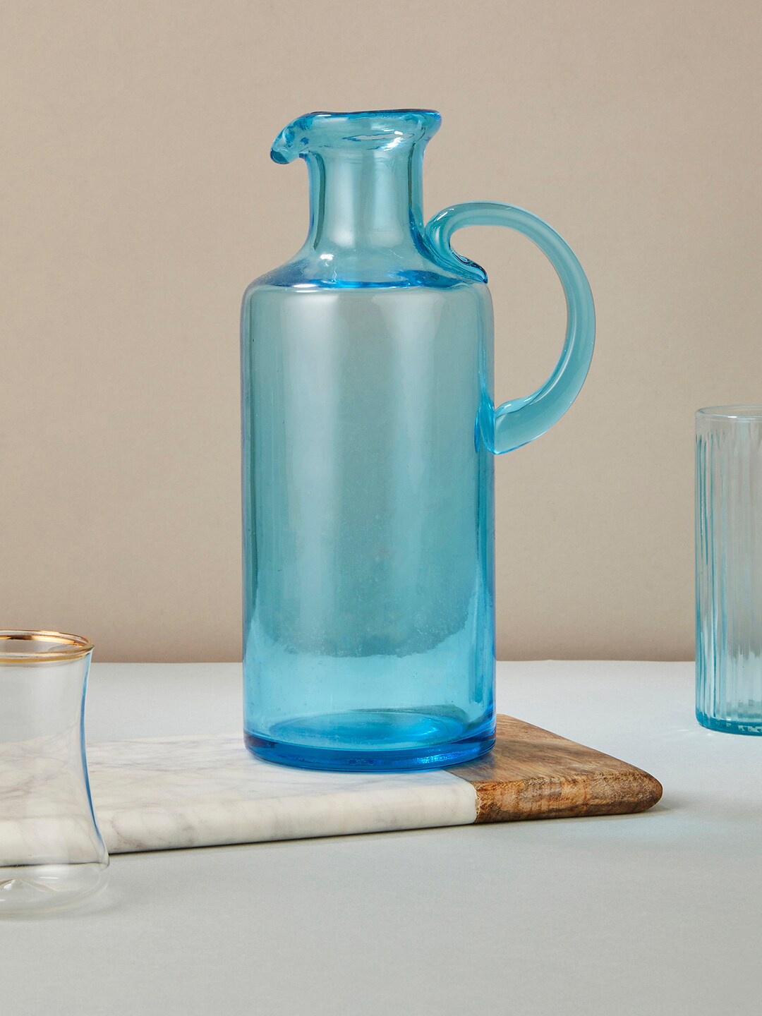 

Fabindia Blue & Transparent 1 Pieces Glass Glossy Dinner Set
