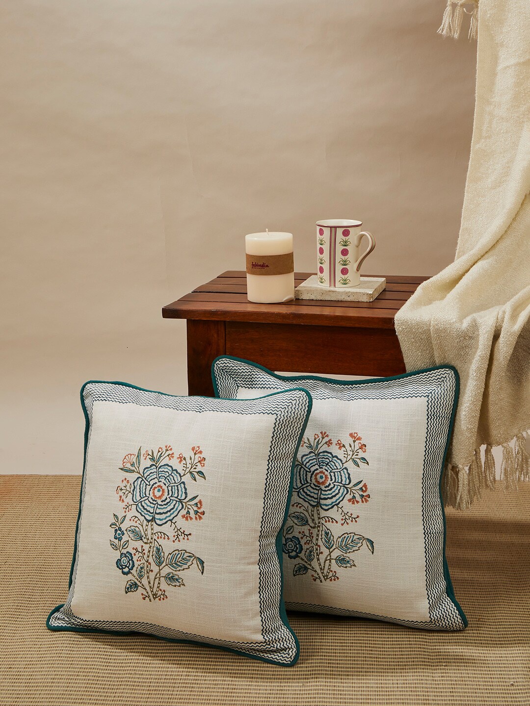 

Fabindia Teal Colourblocked Square Cushion Covers
