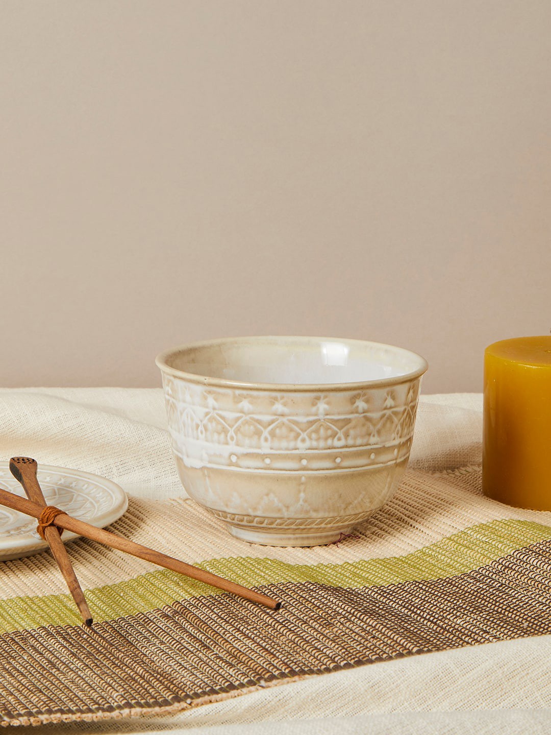 

Fabindia White & Beige Textured Ceramic Bowl