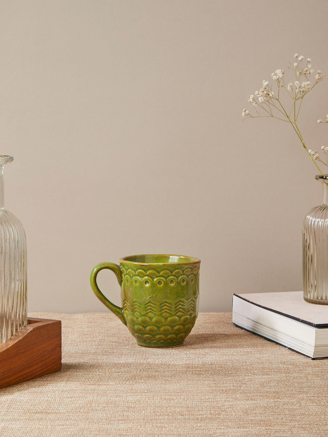 

Fabindia Green Ethnic Motifs Printed Ceramic Glossy Mugs