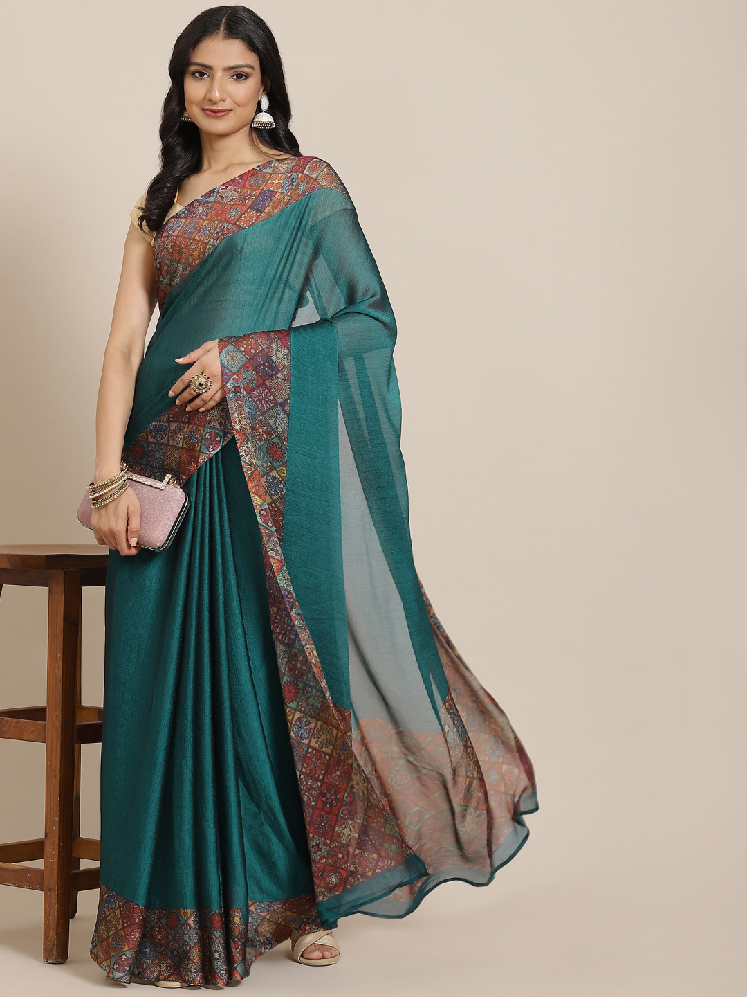 

MIRCHI FASHION Teal Green Solid Saree