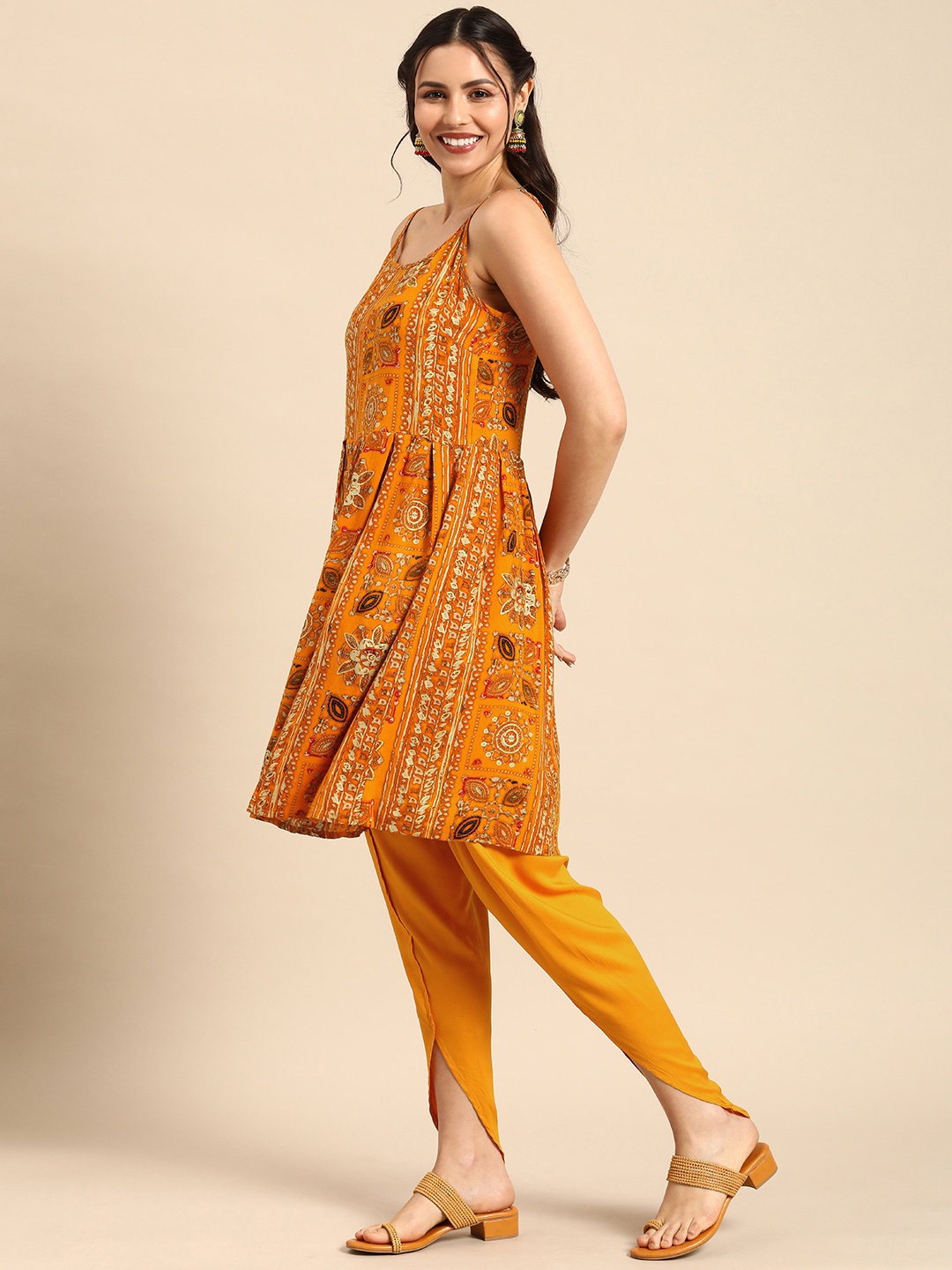 

Sangria Women Ethnic Motifs Printed Pleated Kurta with Dhoti Pants, Orange