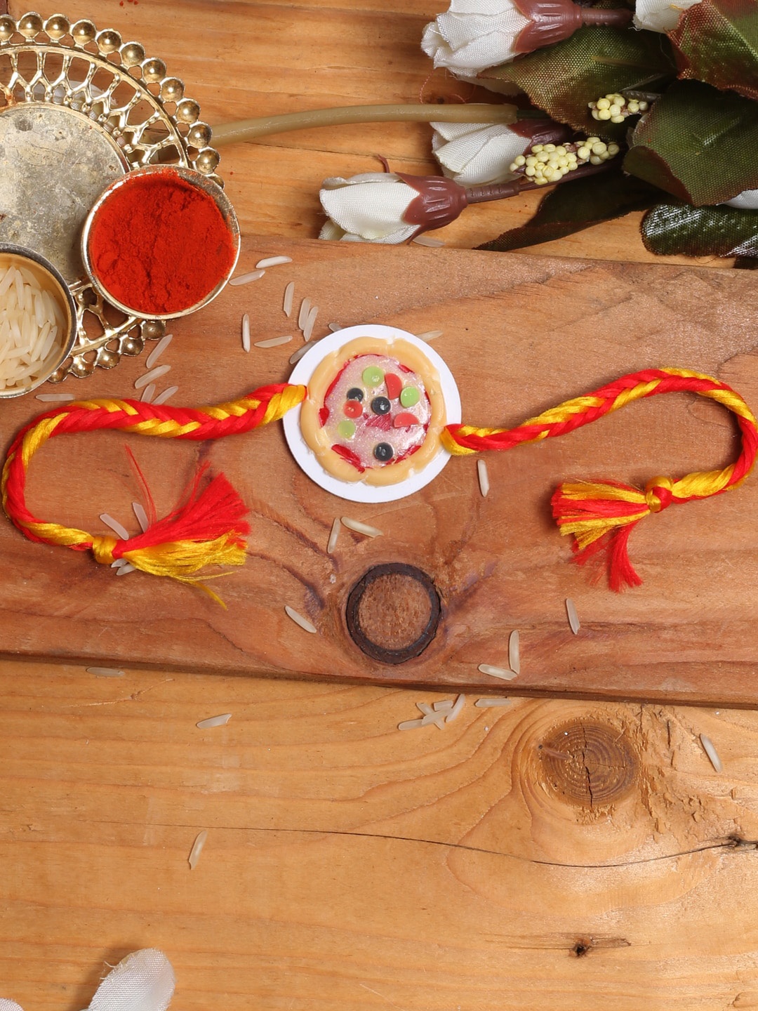 

Aapno Rajasthan Kids Red & White Fruity Tart Rakhi With RoliChawal, Multi