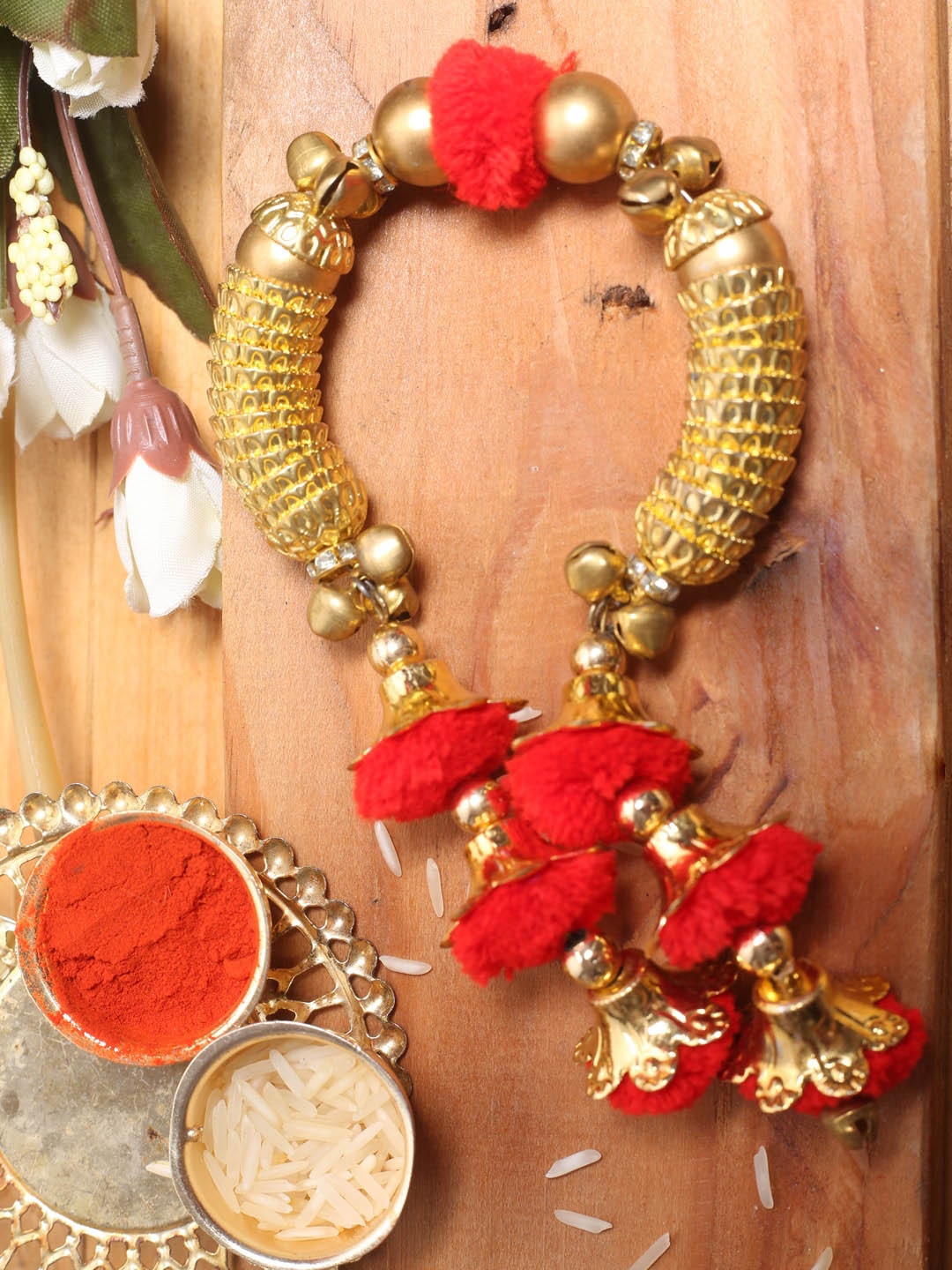 

Aapno Rajasthan Gold Toned Stone Work Hath Phool Rakhi