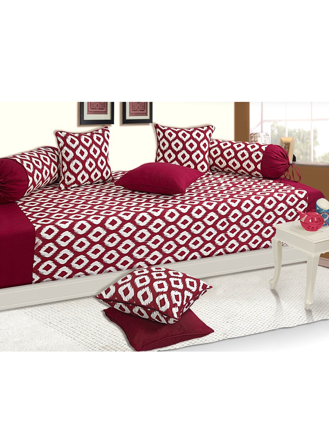 

SHADES of LIFE Maroon & White Printed 8-Pcs Cotton Bedsheet With Bolster & Cushion Covers