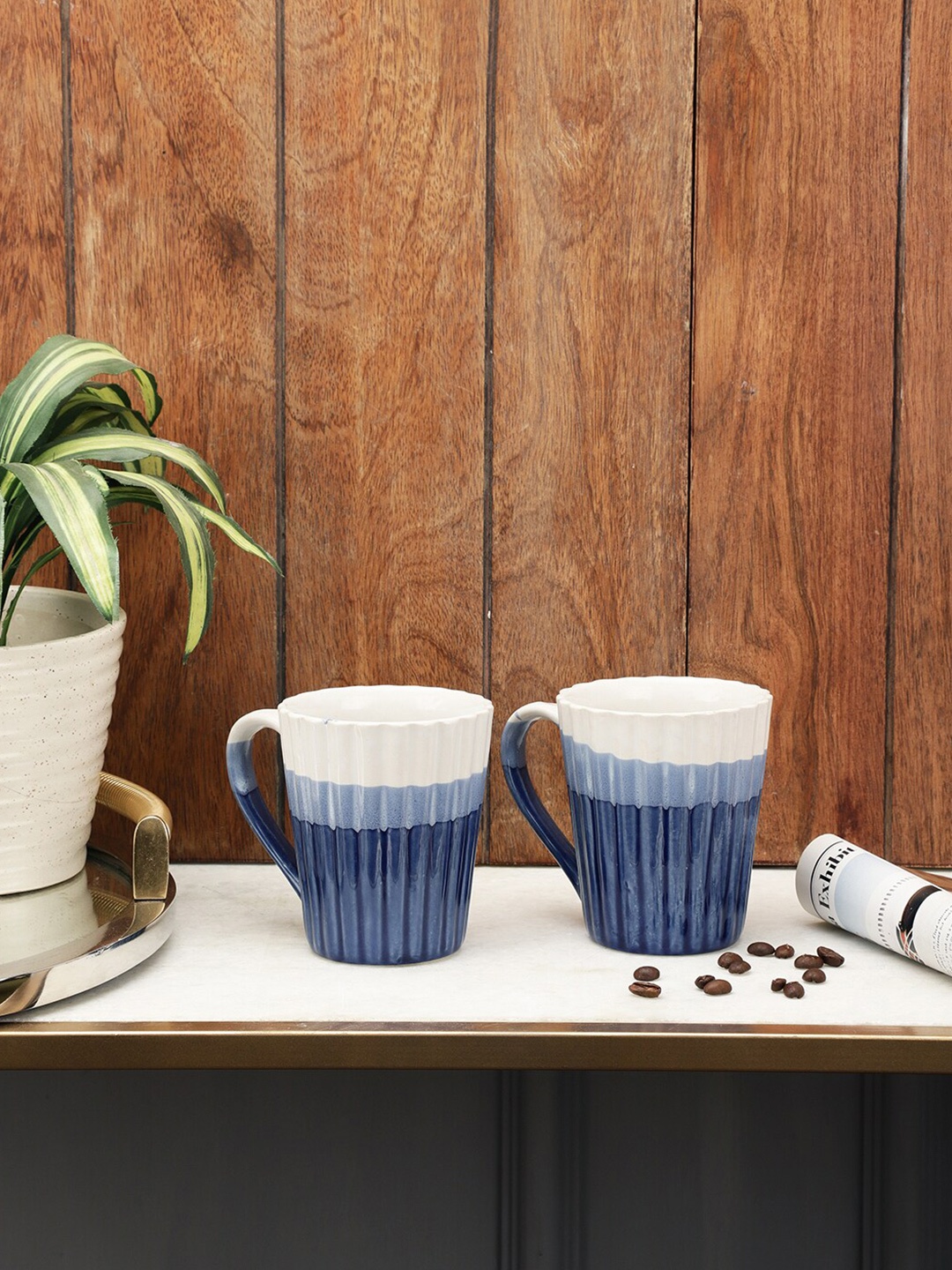 

VarEesha Blue & White Handcrafted and Hand Painted Textured Ceramic Glossy Mugs Set of Cups and Mugs