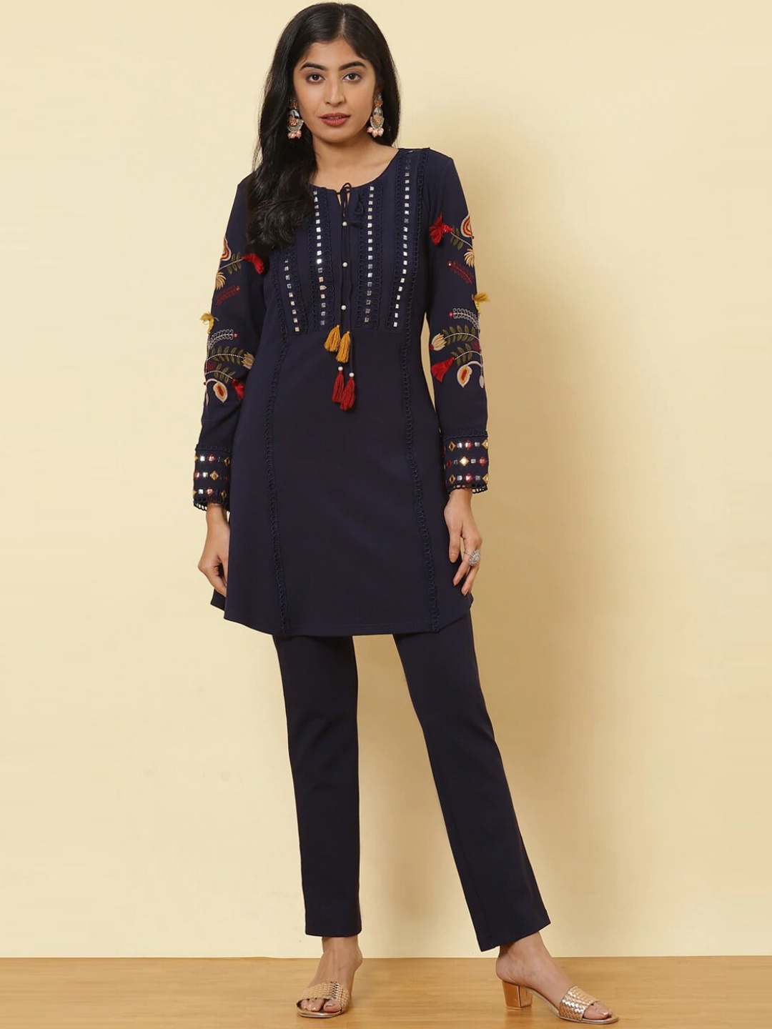 

Lakshita Women Blue Embroidered Flared Sleeves Thread Work Velvet Kurta