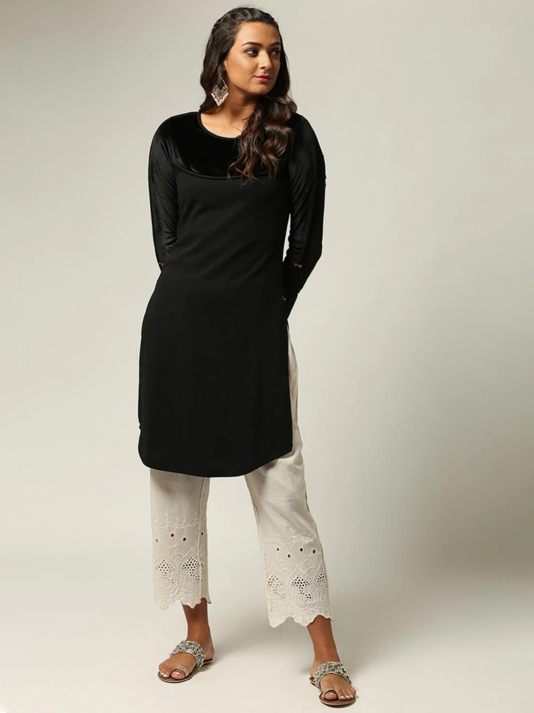 

Lakshita Black Solid Full Sleeved Kurti