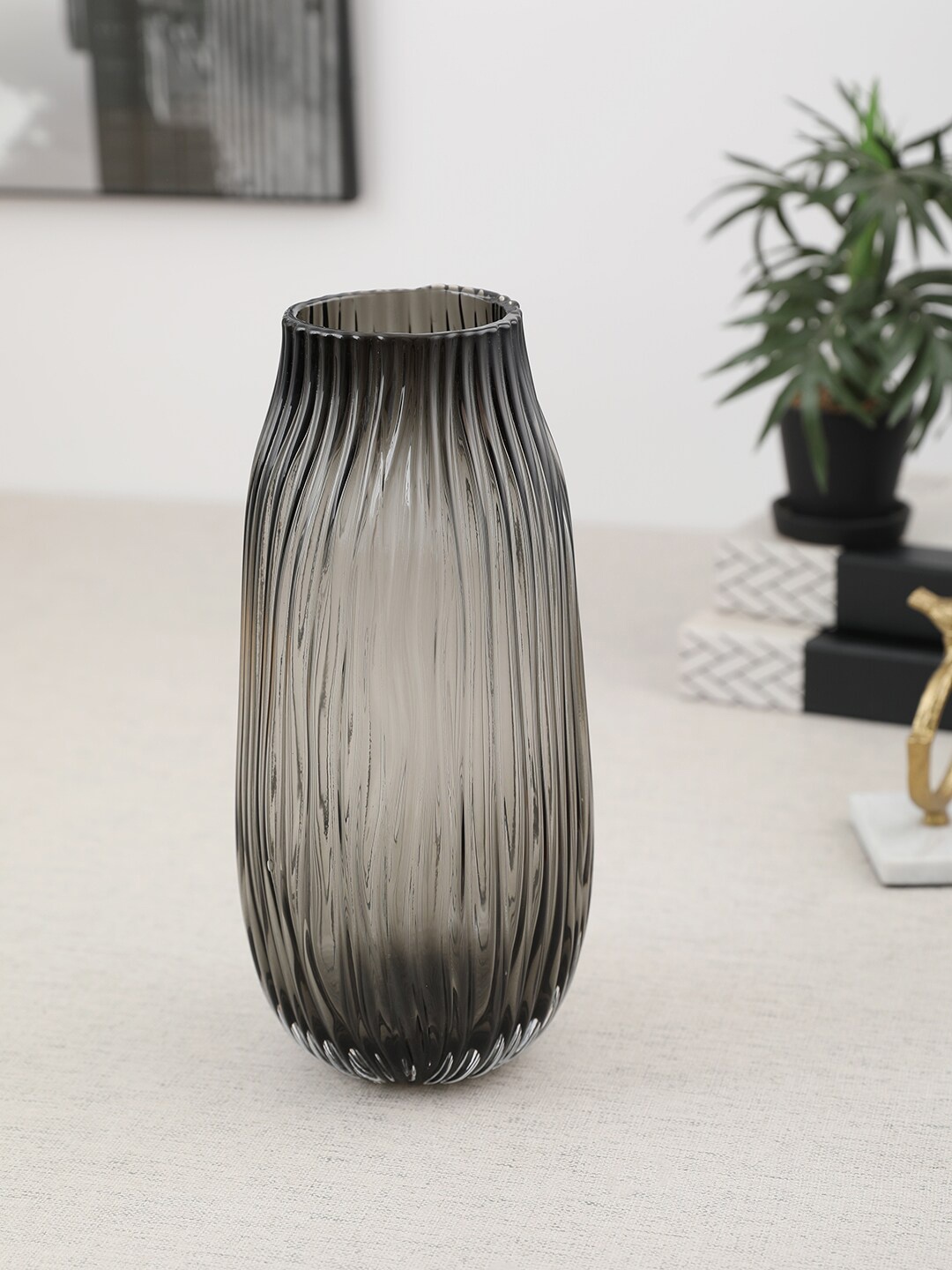 

HomeTown Brown Transparent Textured Glass Vase