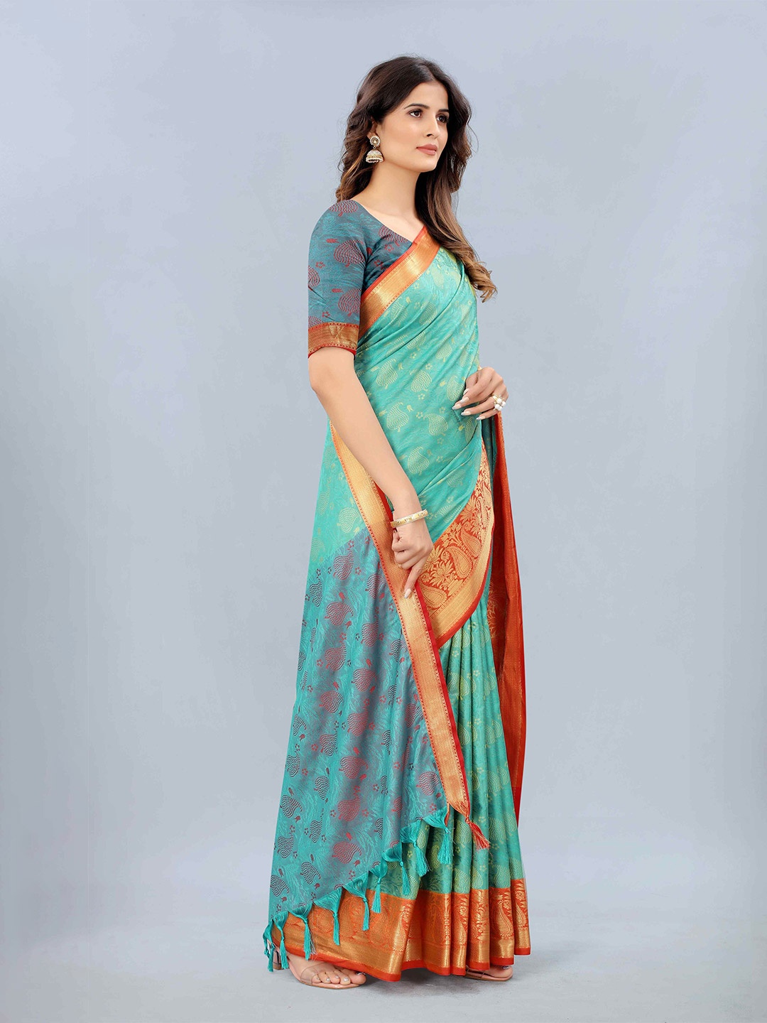 

Mizzific Turquoise Blue & Red Woven Design Zari Silk Cotton Kanjeevaram Saree