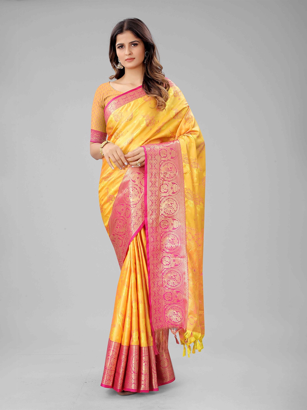 

Mizzific Yellow & Golden Ethnic Motifs Zari Silk Cotton Kanjeevaram Saree