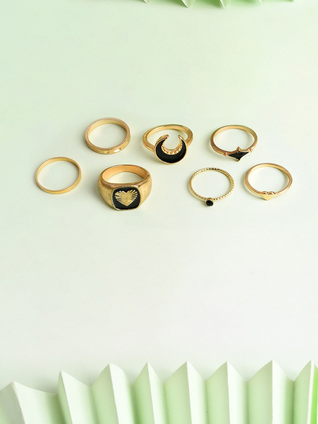 

SOHI Set of 7 Gold-Plated Black Stone Studded Finger Ring