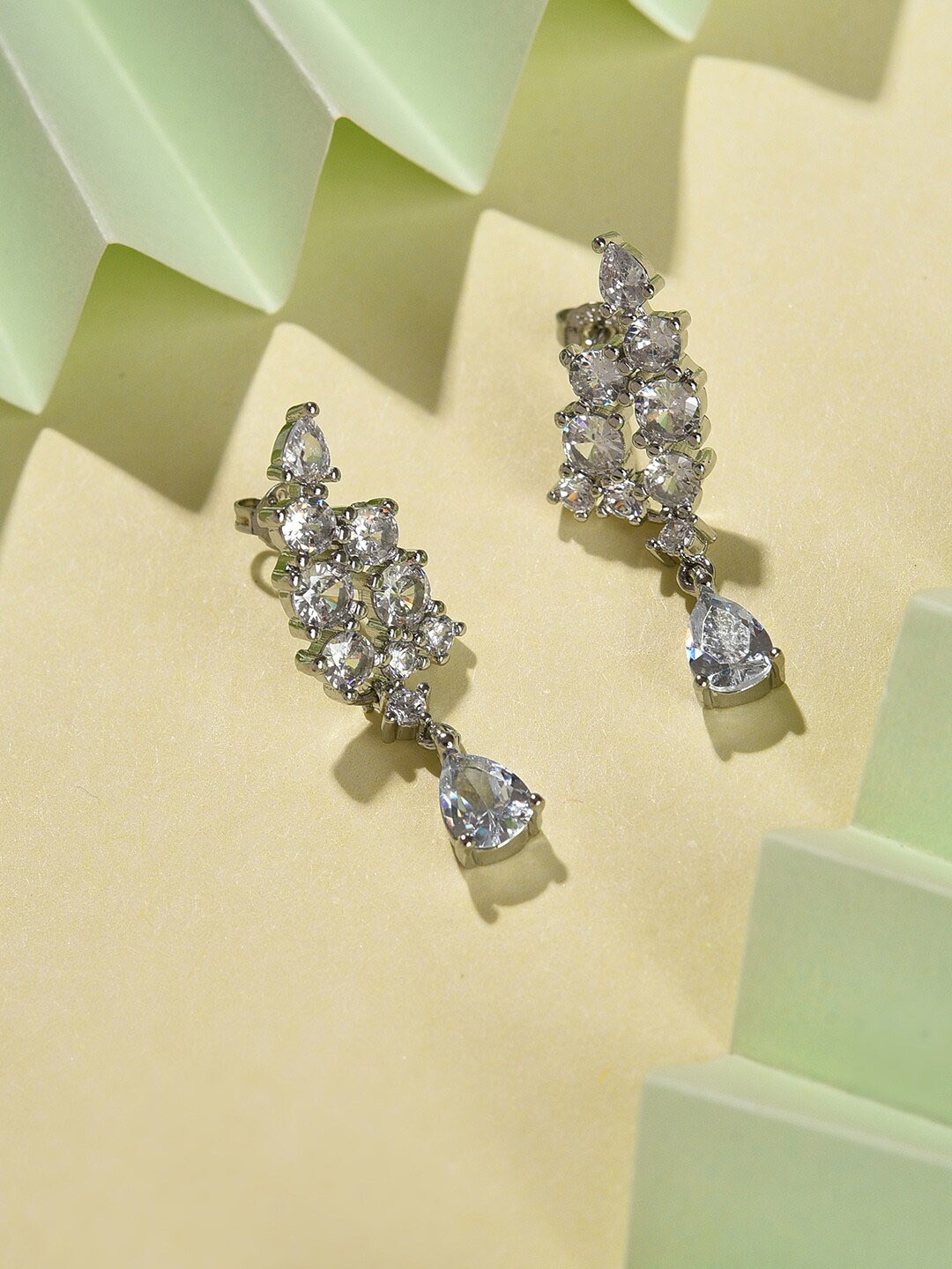 

SOHI Women Silver-Plated Designer Stone Contemporary Drop Earrings
