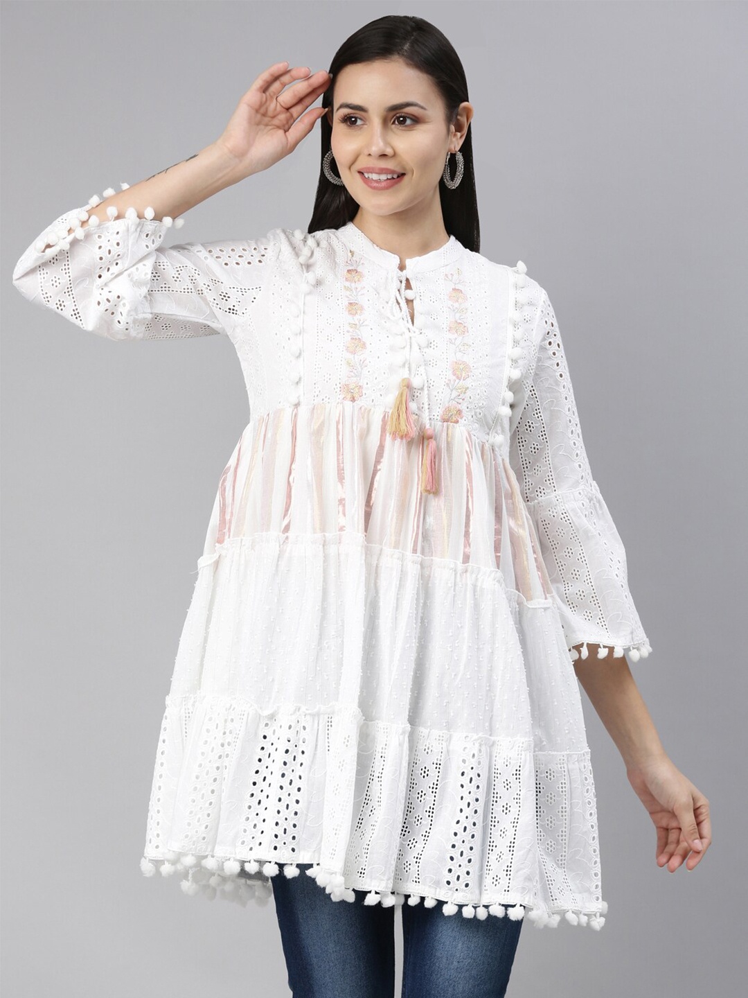 

Neerus White Floral Embroidered Flared Sleeves Thread Work Pure Cotton Tiered Kurti