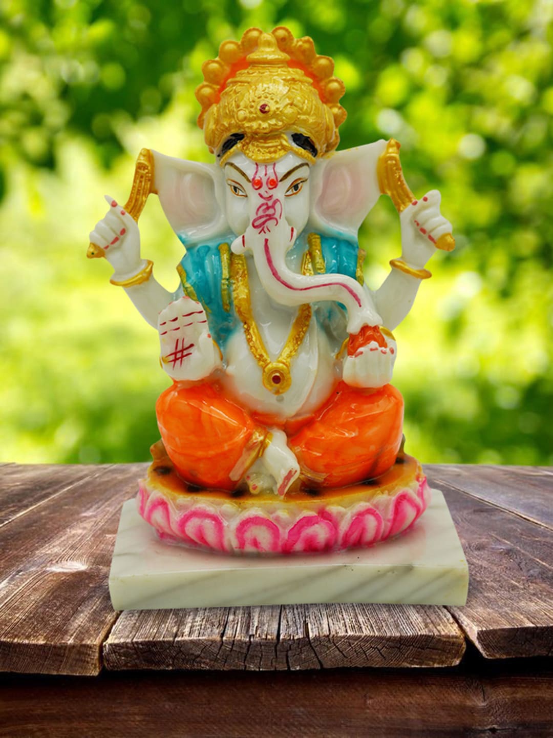 

Gallery99 White & Orange Hand painted Lord Ganpati Idol Showpiece