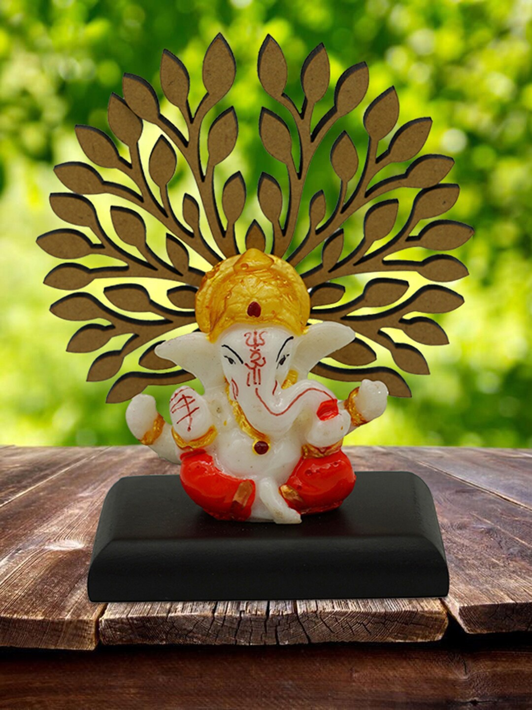 

Gallery99 Orange Decorative Ganesh Idol Statue Murti Showpiece With Wooden Tree