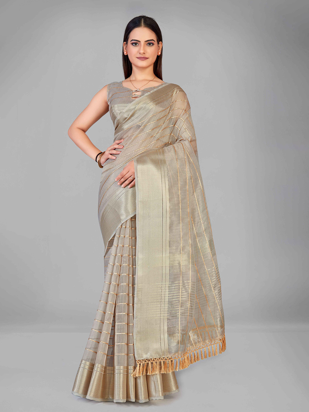 

MANOHARI Grey & Golden Striped Zari Cotton Silk Saree