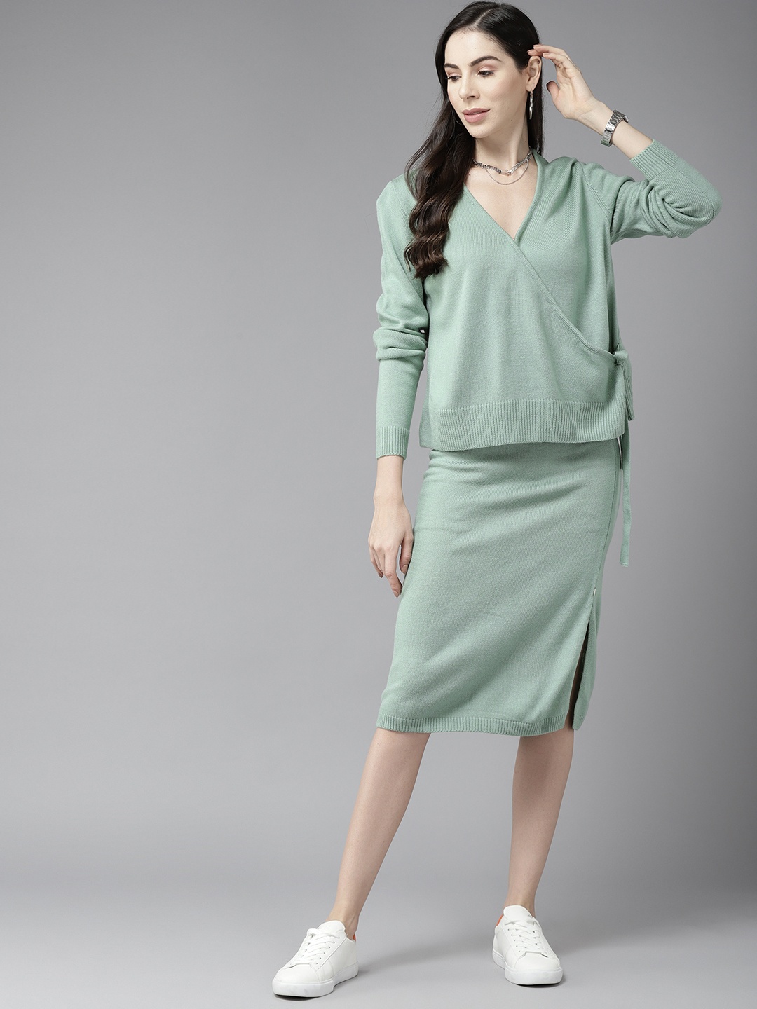 

Roadster Women Green Solid Knitted Sweater with Skirt