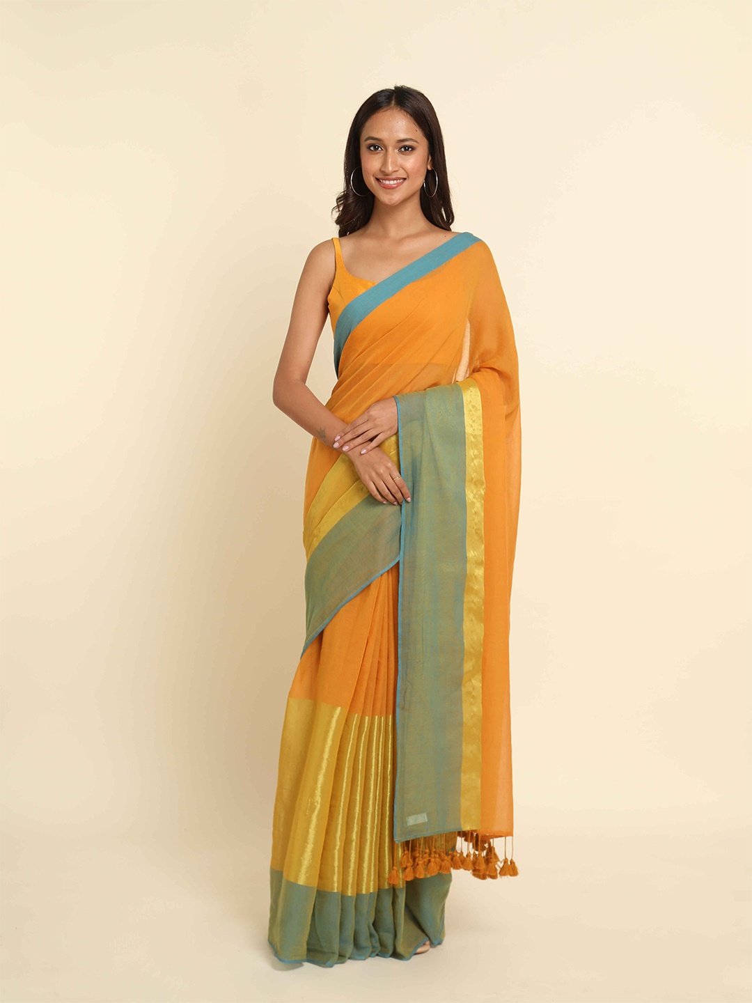 

Suta Orange & Green Colourblocked Saree