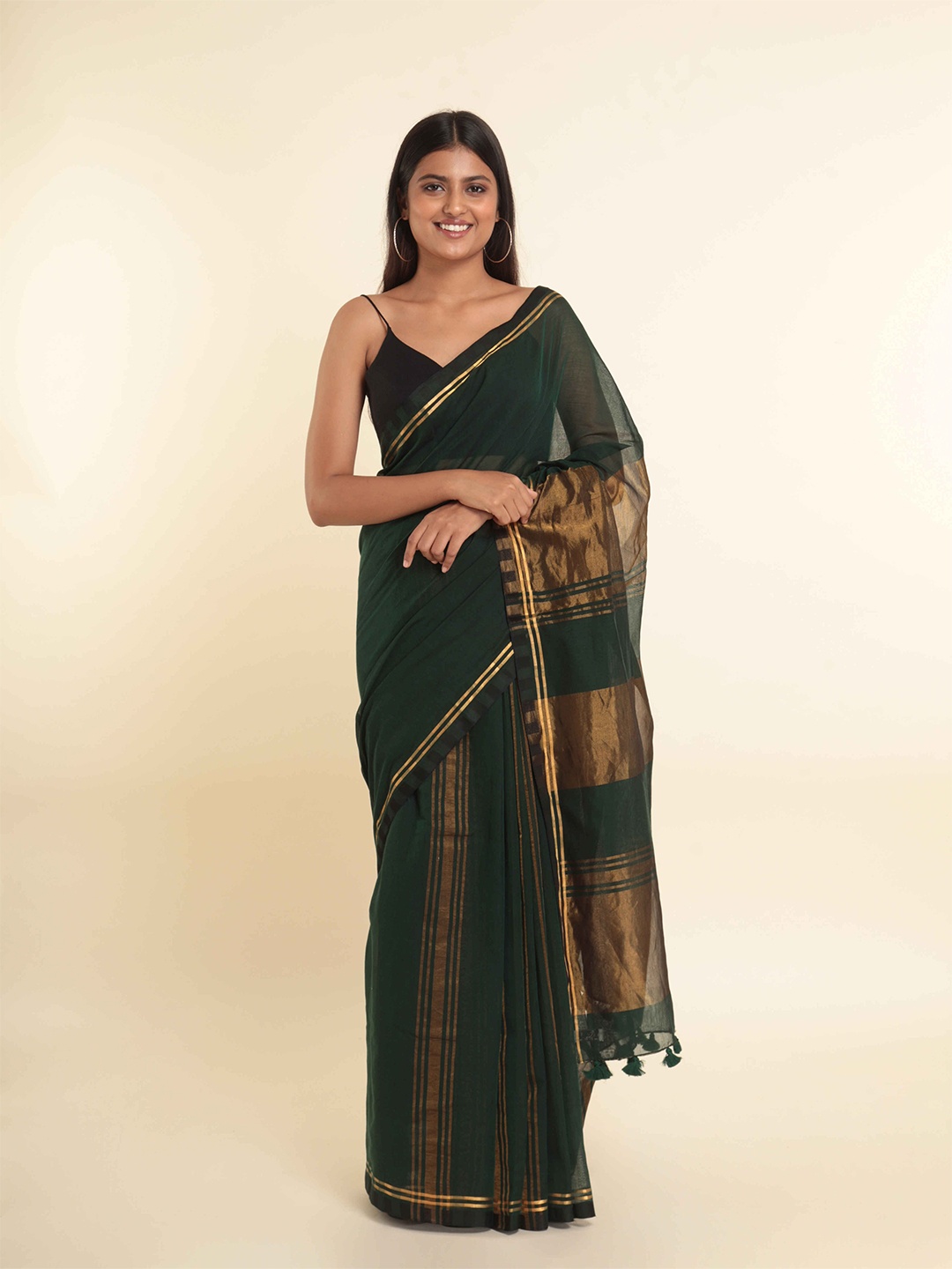 

Suta Green Striped Saree