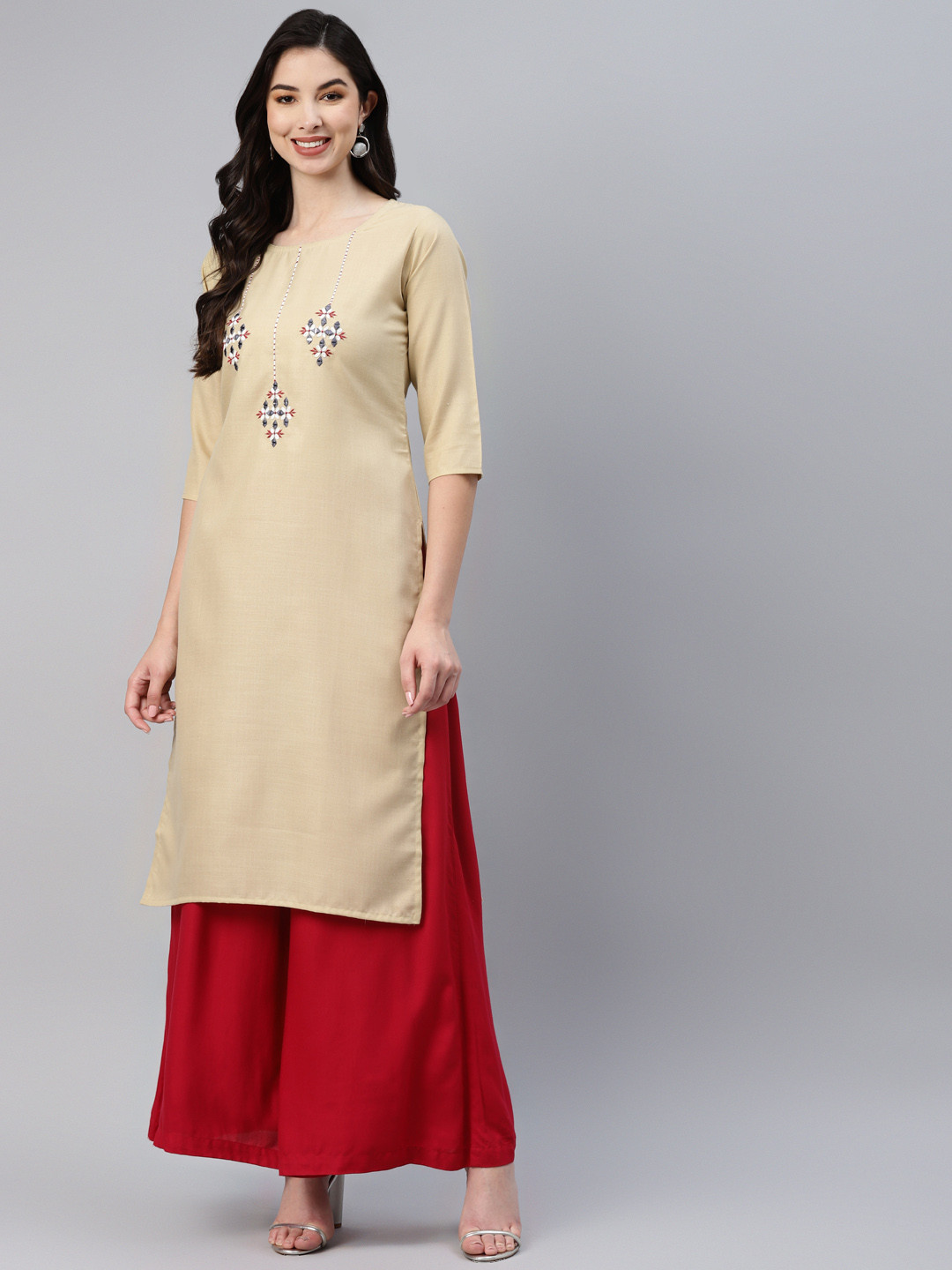 

Aarika Women Beige Ethnic Motifs Embroidered Kurta