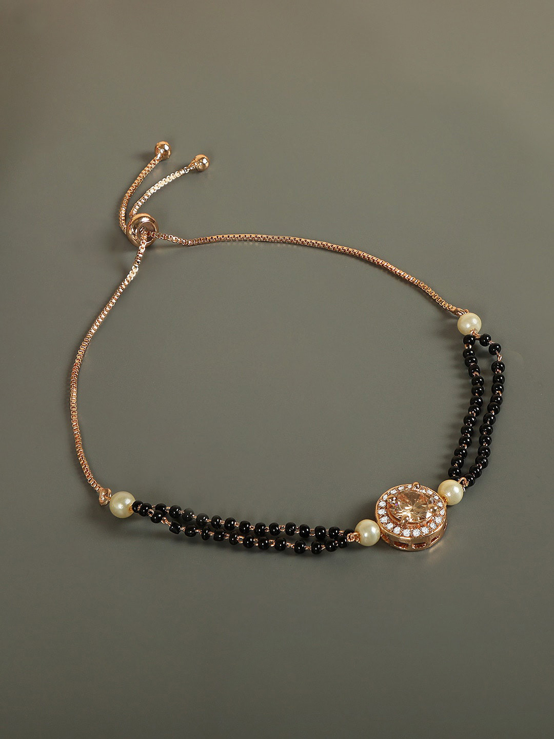 

ZINU Rose gold plated & Black Brass Cubic Zirconia Studded Hand Mangalsutra Bracelet