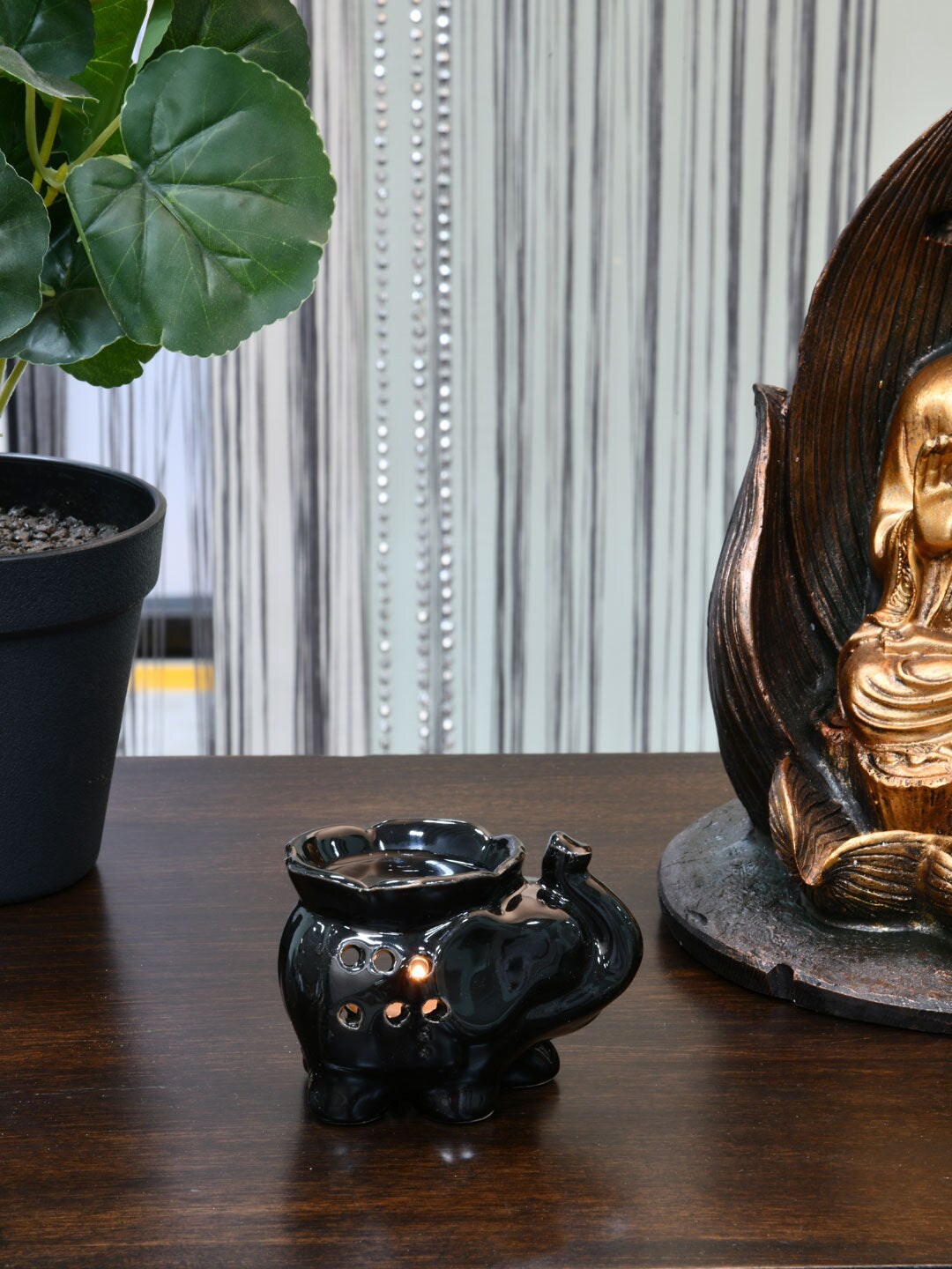 

Athome by Nilkamal Black Elephant Shaped Ceramic Aroma Oil Diffuser