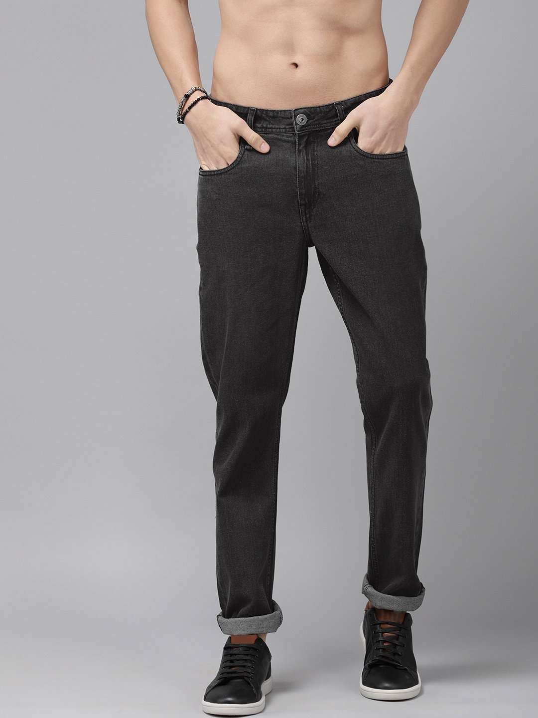 

The Roadster Lifestyle Co Men Black Regular Fit Mid-Rise Stretchable Jeans