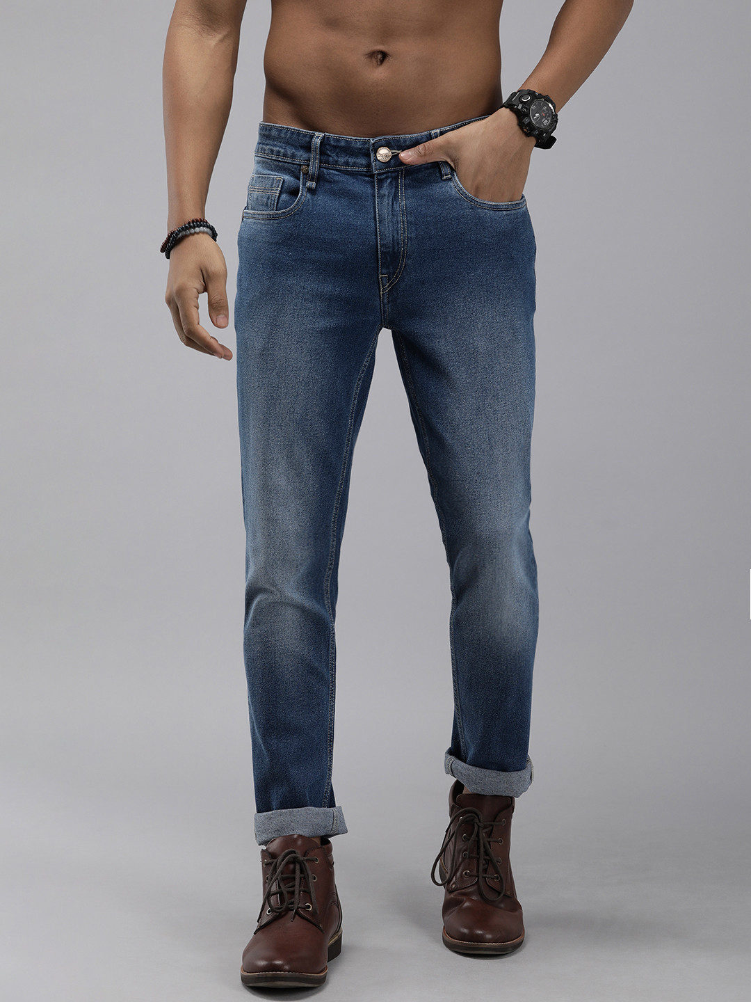

The Roadster Lifestyle Co. Men Blue Skinny Fit Light Fade Stretchable Jeans