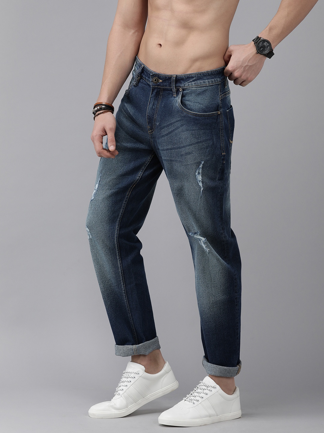 

Roadster Men Blue Slim Fit Mildly Distressed Heavy Fade Stretchable Jeans