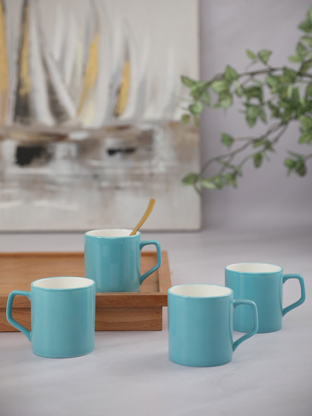 

HomeTown Set of 4 Blue & White Solid Ceramic Glossy Mugs
