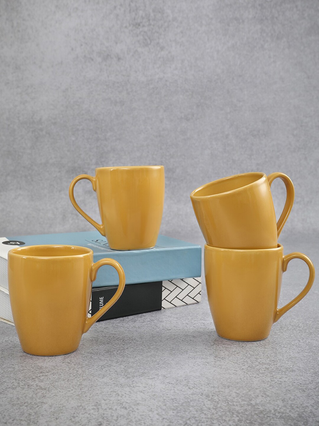 

HomeTown Yellow Solid Ceramic Matte Cups Set of Cups and Mugs
