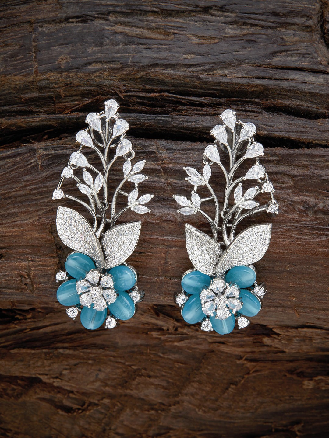 

Kushal's Fashion Jewellery Turquoise Blue Floral Studs Earrings