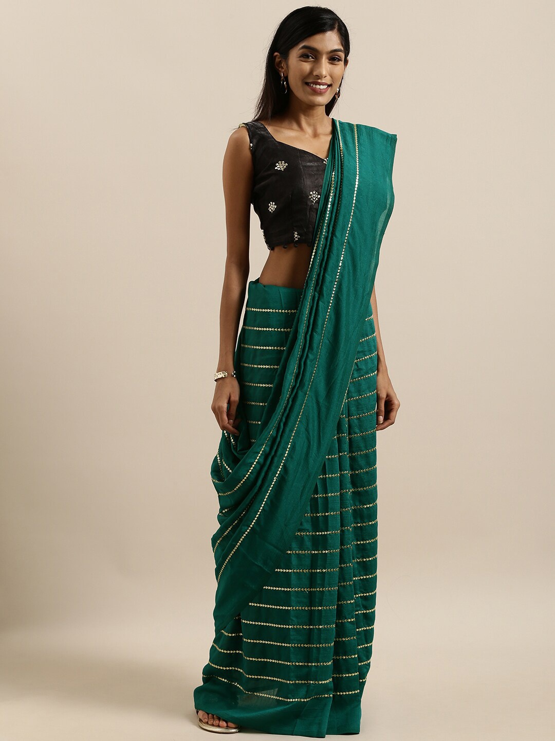 

SHAVYA Teal Green & Silver-Toned Embellished Sequinned Silk Blend Saree