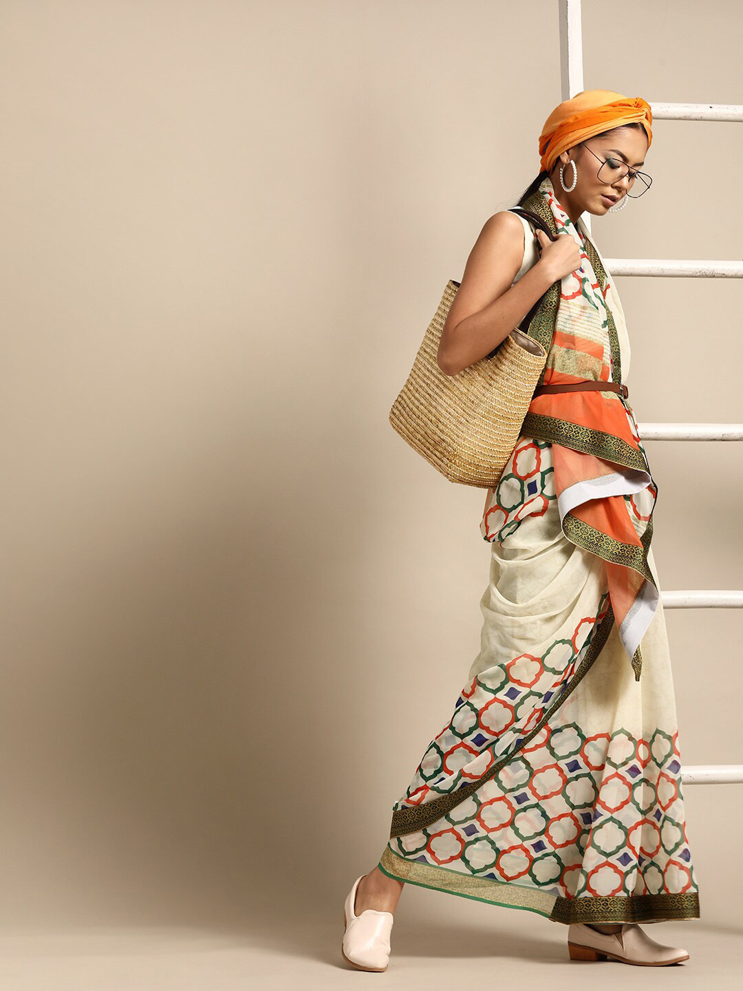 

SHAVYA Off White & Orange Geometric Printed Pure Georgette Saree