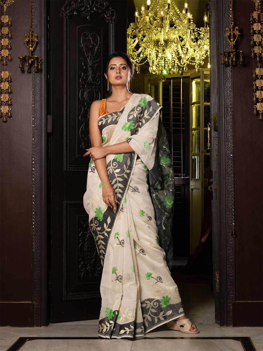 

Charukriti Off White & Green Floral Silk Cotton Jamdani Saree