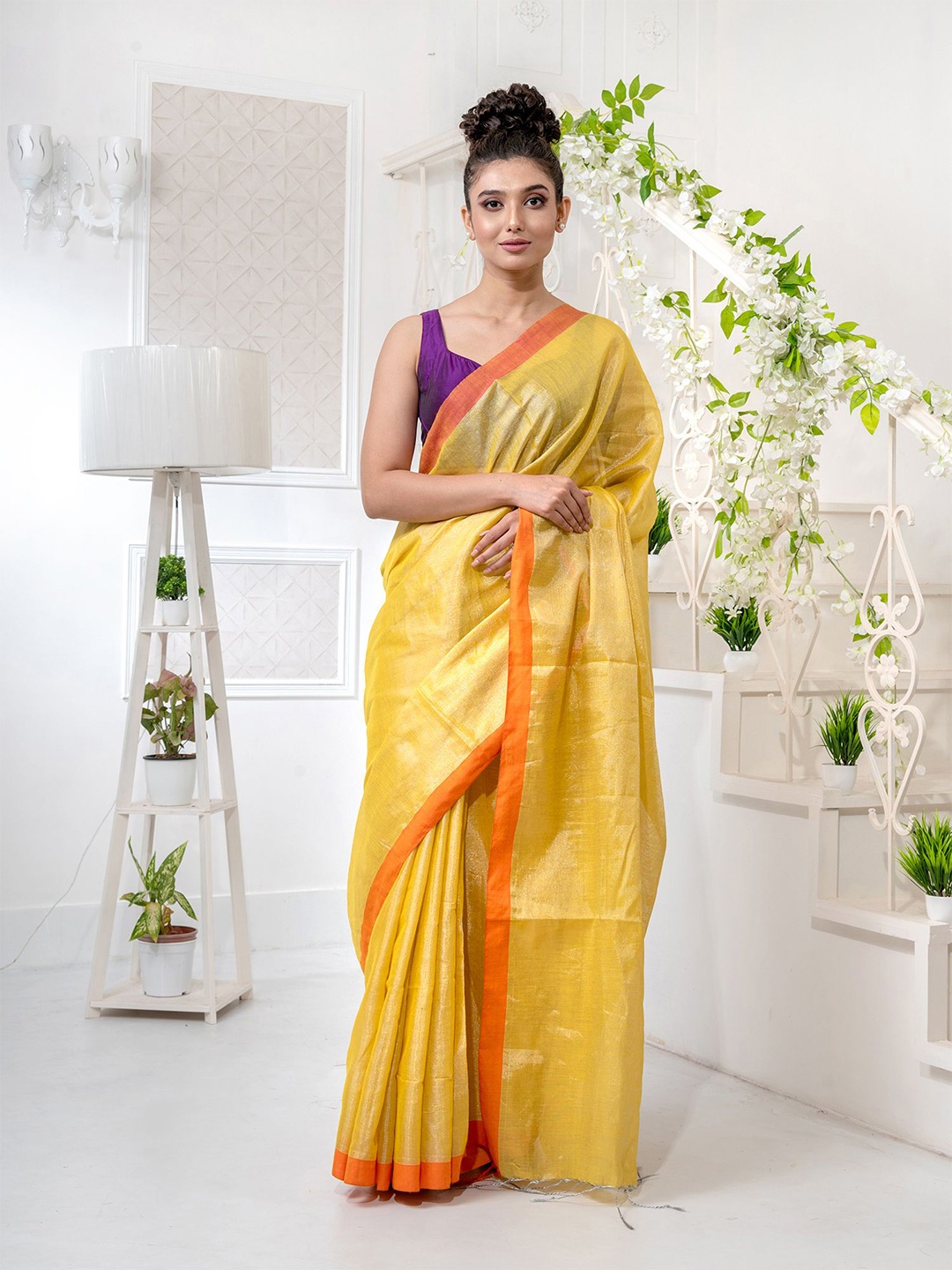 

Charukriti Yellow & Orange Woven Design Tissue Saree