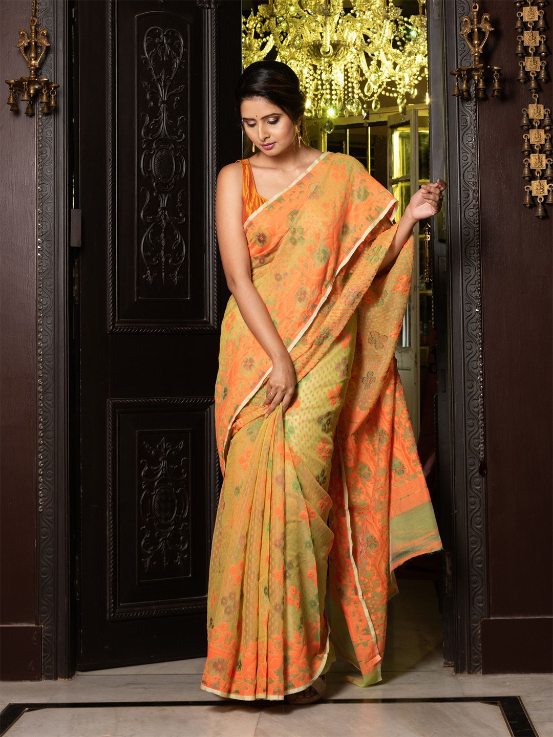

Charukriti Mustard & Orange Floral Zari Silk Cotton Jamdani Saree