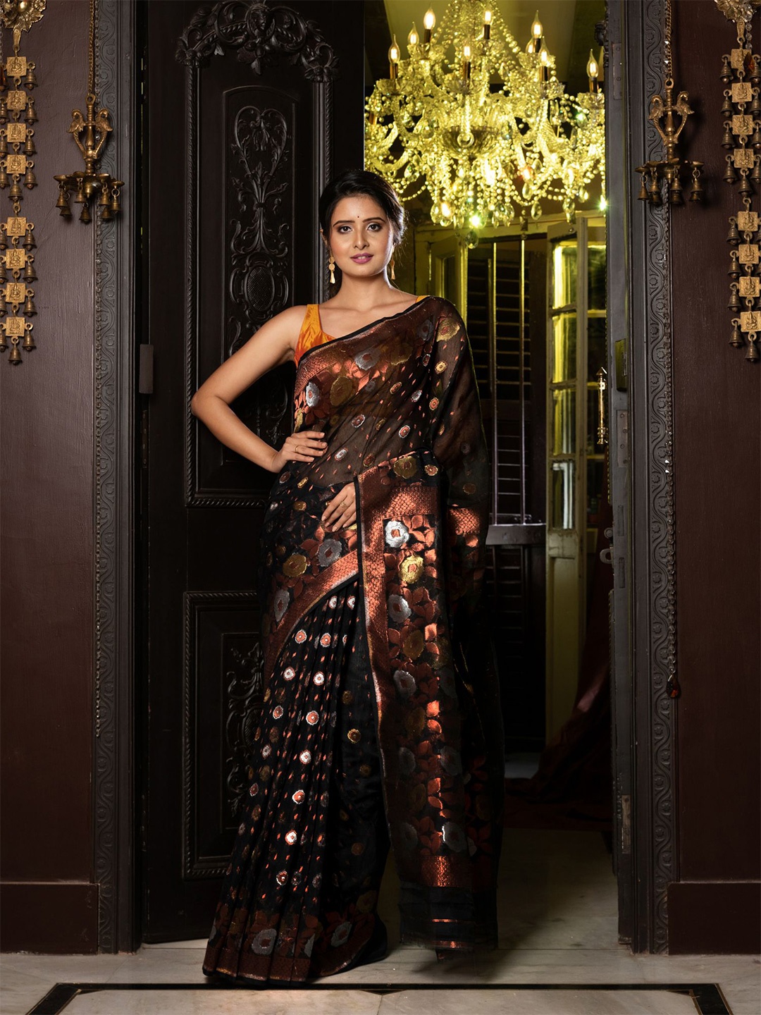 

Charukriti Black & Orange Floral Zari Silk Cotton Jamdani Saree