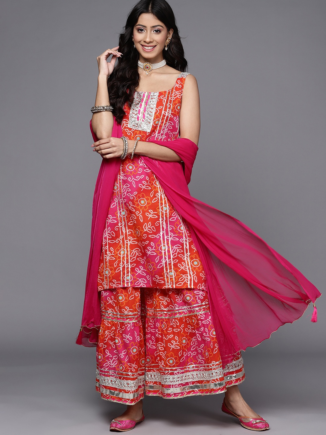 

KSUT Women Pink Bandhani Printed Gotta Patti Pure Cotton Kurta with Sharara & With Dupatta