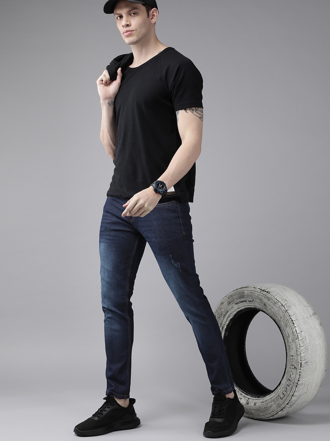 

Roadster Men Navy Blue Skinny Fit Low Distress Light Fade Stretchable Jeans